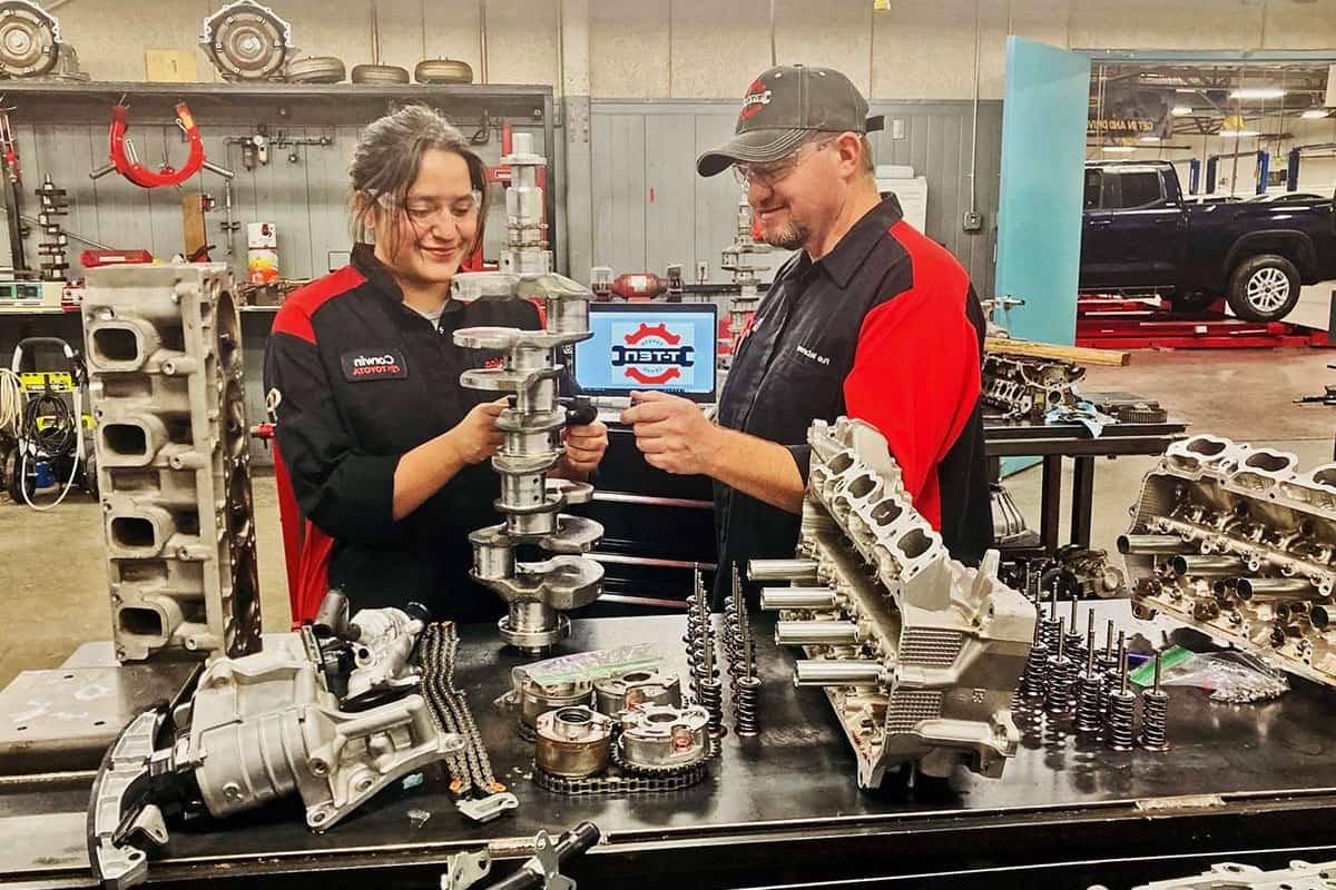 students in the T-TEN program in class working on Toyota parts.